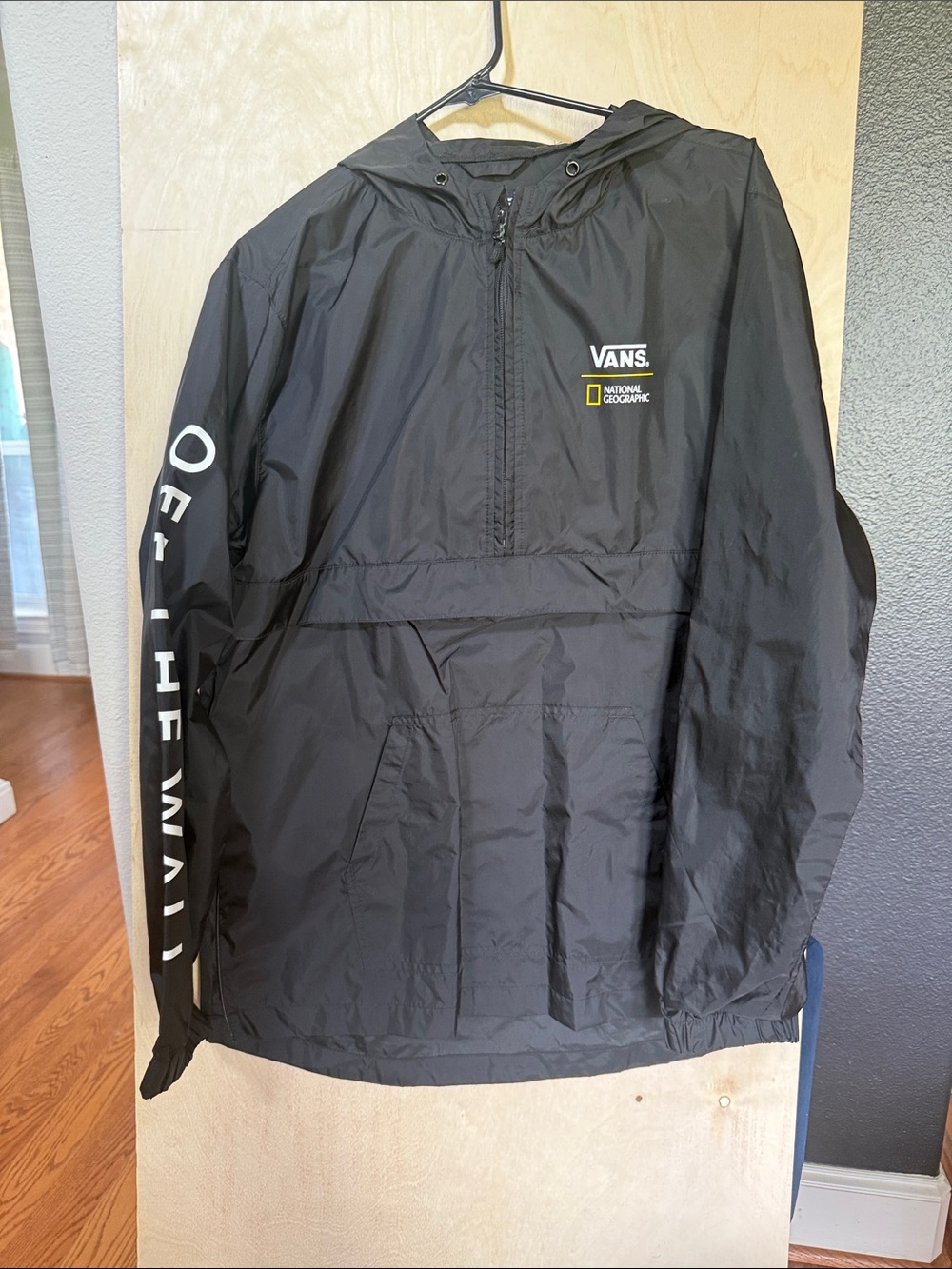 Vans National Geographic Black Hooded Windbreaker with White Sleeve Text